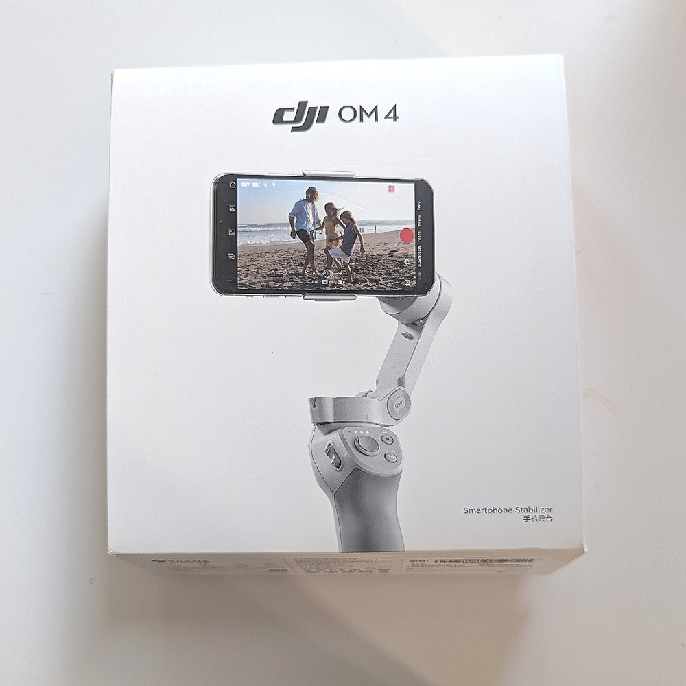 DJI OM 4 Smartphone Gimbal Stabilizer with Case & Manuals